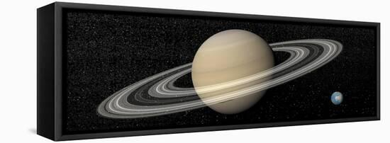 Large Planet Saturn and its Rings Next to Small Planet Earth-null-Framed Stretched Canvas