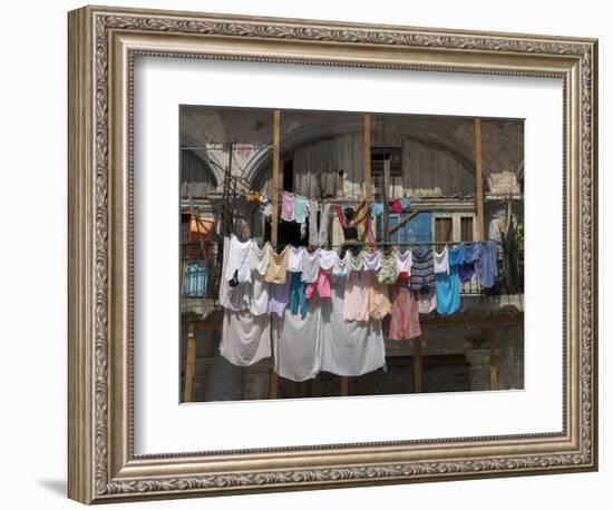 Large Quantity of Laundry Hanging from the Balcony of a Crumbling Building, Habana Vieja, Cuba-Eitan Simanor-Framed Photographic Print