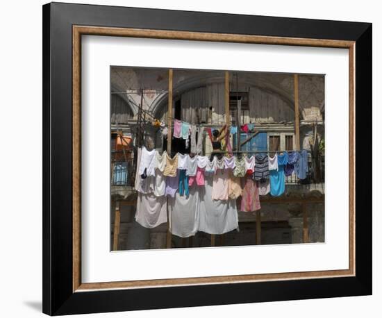 Large Quantity of Laundry Hanging from the Balcony of a Crumbling Building, Habana Vieja, Cuba-Eitan Simanor-Framed Photographic Print