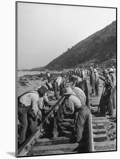 Large Railroad Crews Prying Up Track and Putting in Switch on Railroad Running Through Cajon Pass-Peter Stackpole-Mounted Photographic Print