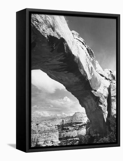 Large Rock Formation Forming a Bridge across Desert-Loomis Dean-Framed Premier Image Canvas