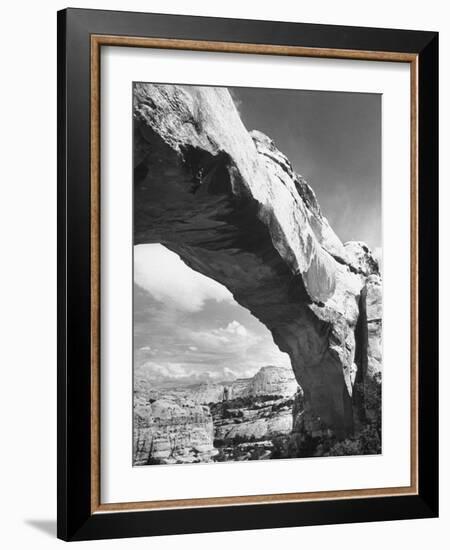 Large Rock Formation Forming a Bridge across Desert-Loomis Dean-Framed Photographic Print