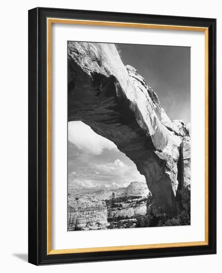 Large Rock Formation Forming a Bridge across Desert-Loomis Dean-Framed Photographic Print