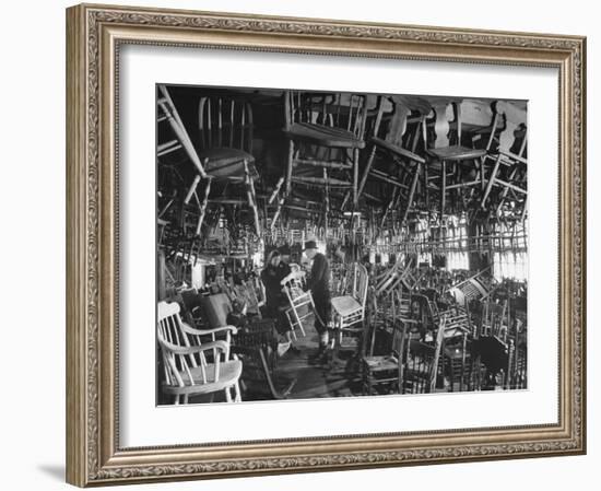 Large Room Full of Chairs Being Offered For Sale in an Antique Shop-Walter Sanders-Framed Photographic Print