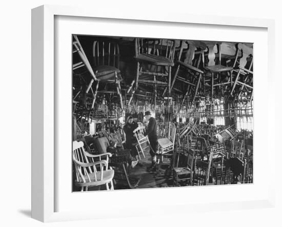 Large Room Full of Chairs Being Offered For Sale in an Antique Shop-Walter Sanders-Framed Photographic Print