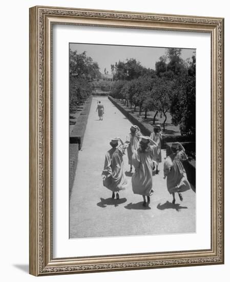 Late For Graduation, Five Seniors Holding on to Their Caps and Race to the Ceremony-Ed Clark-Framed Photographic Print