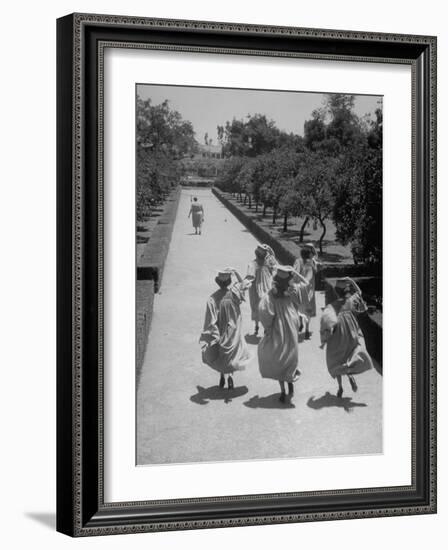 Late For Graduation, Five Seniors Holding on to Their Caps and Race to the Ceremony-Ed Clark-Framed Photographic Print