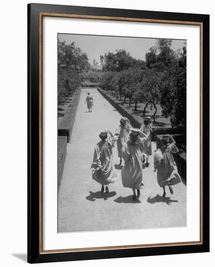 Late For Graduation, Five Seniors Holding on to Their Caps and Race to the Ceremony-Ed Clark-Framed Photographic Print