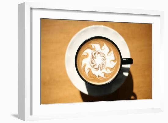 Latte Art, Designs Drawn With Steamed Milk In Hot Fresh Rich Coffee In A Ceramic Coffee Cup-mikeledray-Framed Art Print