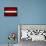 Latvia Flag Design with Wood Patterning - Flags of the World Series-Philippe Hugonnard-Framed Stretched Canvas displayed on a wall