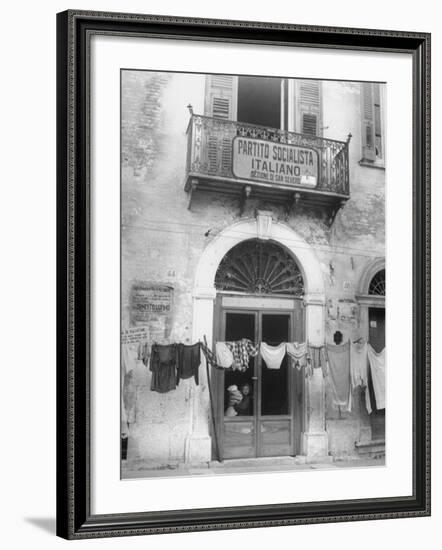 Laundry Hanging in Front of Local Headquarters-Walter Sanders-Framed Premium Photographic Print