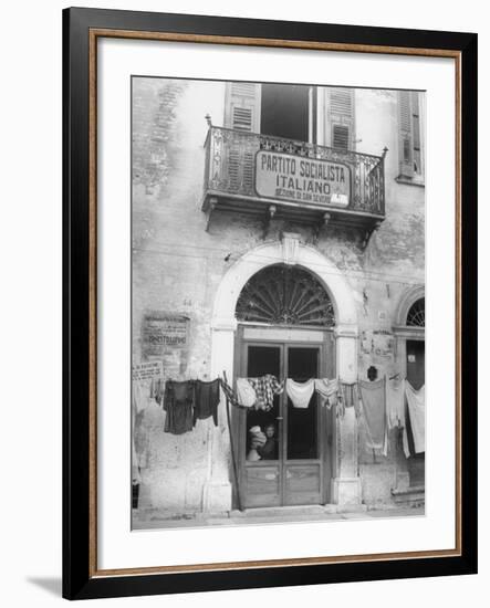 Laundry Hanging in Front of Local Headquarters-Walter Sanders-Framed Premium Photographic Print