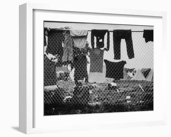 Laundry Hanging on Fence at Woodstock Music Festival-Bill Eppridge-Framed Photographic Print