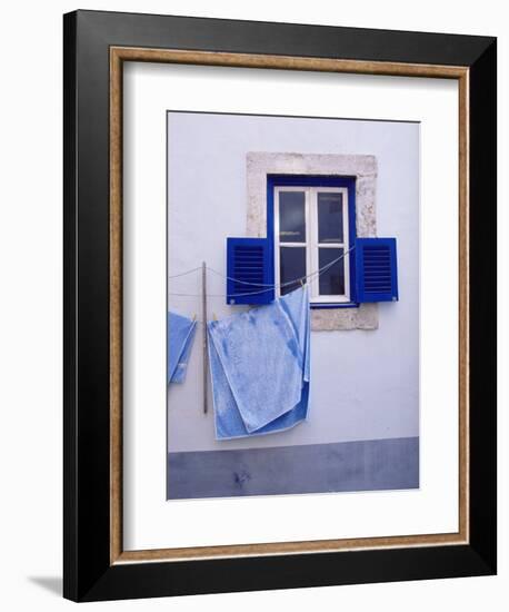 Laundry Hanging on Line at Window in the Moorish Quarter of Alfama, Lisbon, Portugal-Yadid Levy-Framed Photographic Print