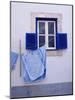 Laundry Hanging on Line at Window in the Moorish Quarter of Alfama, Lisbon, Portugal-Yadid Levy-Mounted Photographic Print
