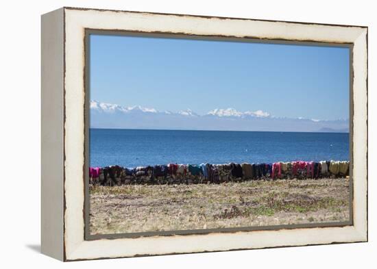 Laundry Hangs on a Wall on Isla Del Sol Along the Edge of Lake Titicaca-Alex Saberi-Framed Premier Image Canvas