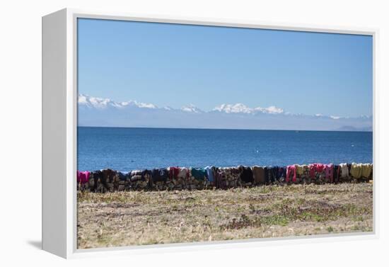 Laundry Hangs on a Wall on Isla Del Sol Along the Edge of Lake Titicaca-Alex Saberi-Framed Premier Image Canvas