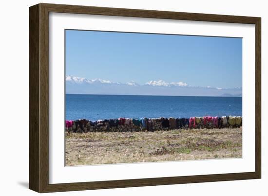 Laundry Hangs on a Wall on Isla Del Sol Along the Edge of Lake Titicaca-Alex Saberi-Framed Photographic Print