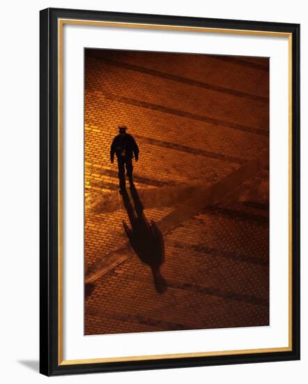 Law Enforcement Officer Patrols before the Opening Ceremony for the Vancouver 2010 Olympics-null-Framed Photographic Print