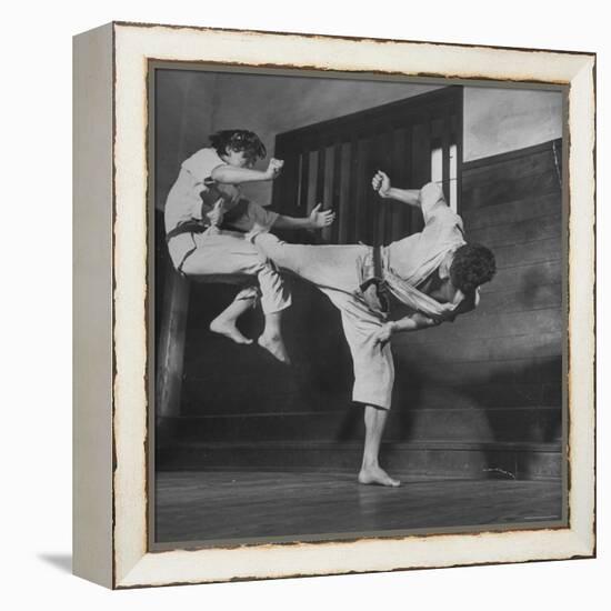 Law Student Gojuro Harada Uses Right Foot on the stomach to ward off attack of economics student-John Florea-Framed Premier Image Canvas