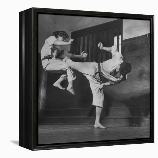 Law Student Gojuro Harada Uses Right Foot on the stomach to ward off attack of economics student-John Florea-Framed Premier Image Canvas