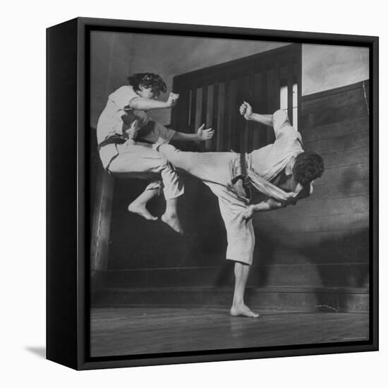 Law Student Gojuro Harada Uses Right Foot on the stomach to ward off attack of economics student-John Florea-Framed Premier Image Canvas