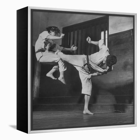 Law Student Gojuro Harada Uses Right Foot on the stomach to ward off attack of economics student-John Florea-Framed Premier Image Canvas