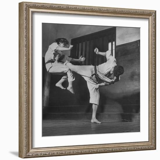 Law Student Gojuro Harada Uses Right Foot on the stomach to ward off attack of economics student-John Florea-Framed Photographic Print