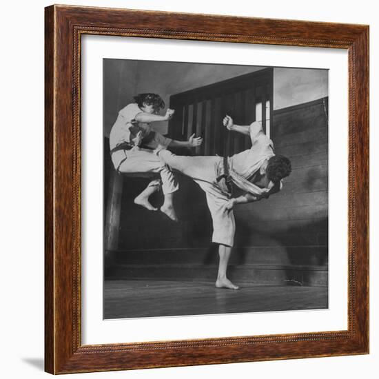 Law Student Gojuro Harada Uses Right Foot on the stomach to ward off attack of economics student-John Florea-Framed Photographic Print