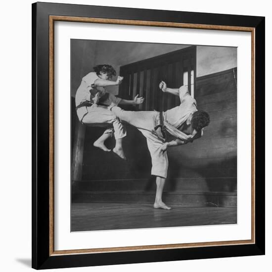 Law Student Gojuro Harada Uses Right Foot on the stomach to ward off attack of economics student-John Florea-Framed Photographic Print