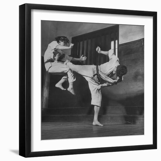 Law Student Gojuro Harada Uses Right Foot on the stomach to ward off attack of economics student-John Florea-Framed Photographic Print