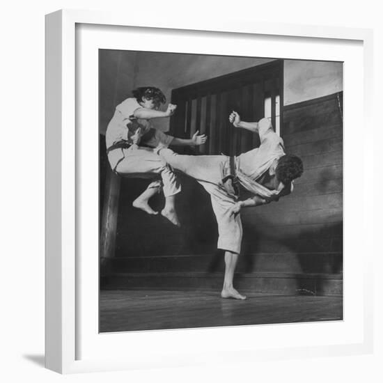 Law Student Gojuro Harada Uses Right Foot on the stomach to ward off attack of economics student-John Florea-Framed Photographic Print