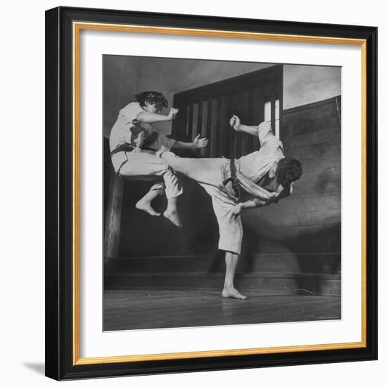 Law Student Gojuro Harada Uses Right Foot on the stomach to ward off attack of economics student-John Florea-Framed Photographic Print