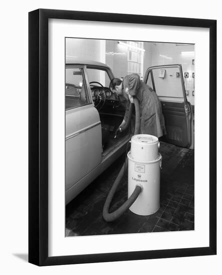 Laycock Vacacar Vacuum Cleaner in Use at an Esso Garage, Sheffield, South Yorkshire, 1965-Michael Walters-Framed Photographic Print