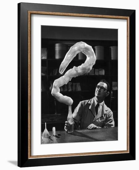 Leaping Rubber Explosively from Butadiene Gas in Bottle as Demonstrated by M.I.T.'s Dr. A. Morton-W^ Eugene Smith-Framed Photographic Print