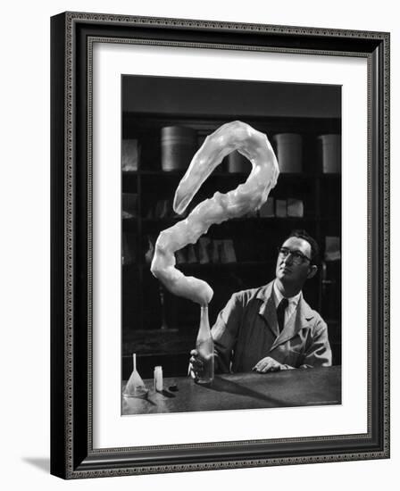 Leaping Rubber Explosively from Butadiene Gas in Bottle as Demonstrated by M.I.T.'s Dr. A. Morton-W^ Eugene Smith-Framed Photographic Print