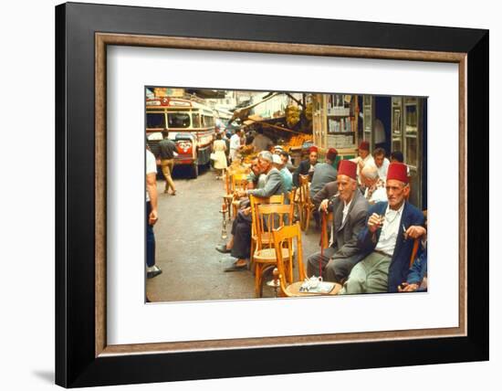 Lebanese Gentlemen sits at a steetside cafe sipping tea and smoking traditional narghile pipes-Carlo Bavagnoli-Framed Photographic Print