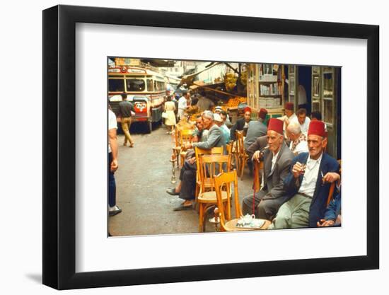 Lebanese Gentlemen sits at a steetside cafe sipping tea and smoking traditional narghile pipes-Carlo Bavagnoli-Framed Photographic Print