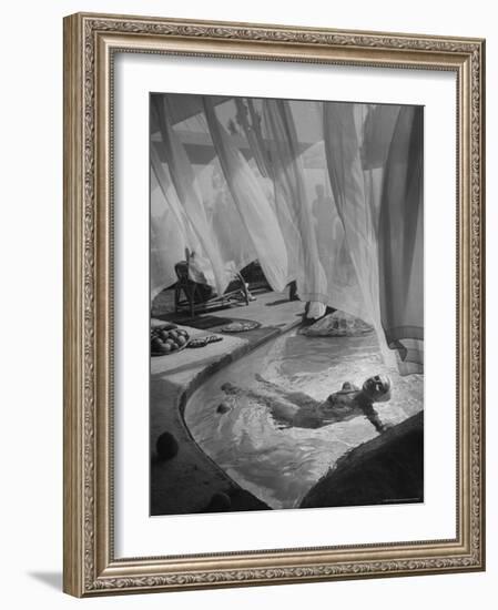 Lee Anderson Swimming Into Living Room of Raymond Loewy's House-Peter Stackpole-Framed Photographic Print