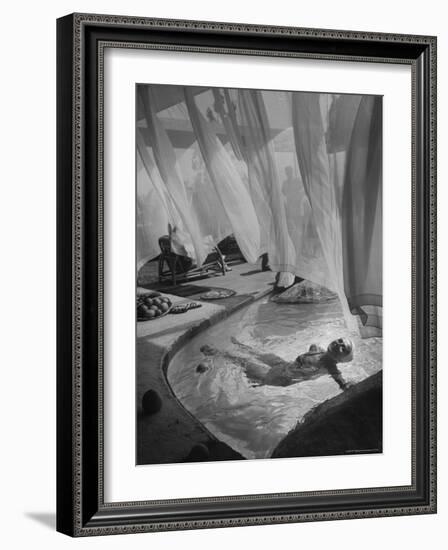 Lee Anderson Swimming Into Living Room of Raymond Loewy's House-Peter Stackpole-Framed Photographic Print