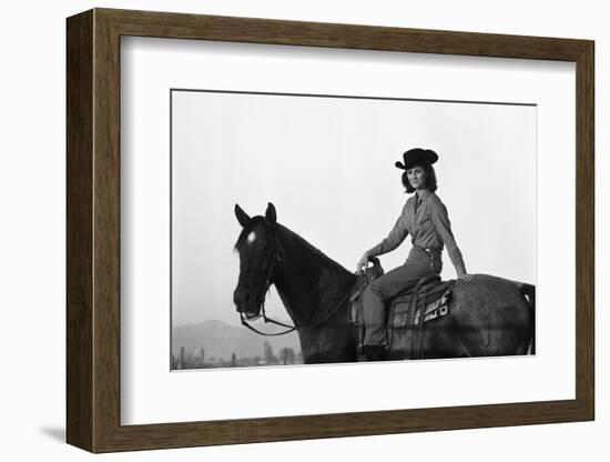 Lee Archer, 24, Riding a Horse at O.B. Llyod Stables in Scottsdale, Arizona, October 1960-Allan Grant-Framed Photographic Print