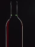 Backlit Shot of a Bottle of Red Wine-Lee Frost-Photographic Print