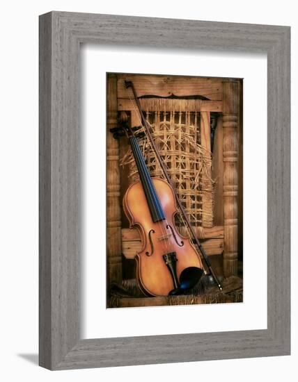 Left Handled Violin Lying on an Old and Ruined Chair-AGCuesta-Framed Photographic Print