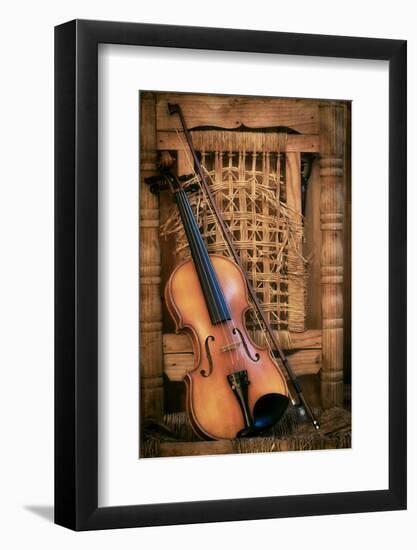 Left Handled Violin Lying on an Old and Ruined Chair-AGCuesta-Framed Photographic Print