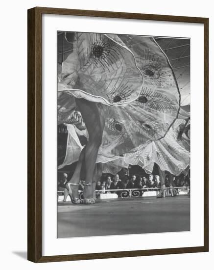 Legs and Swirling Skirts of Chorus Girls in Routine at Harem Club-Gjon Mili-Framed Photographic Print