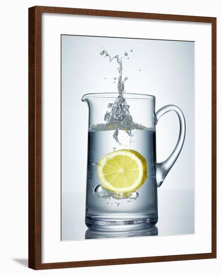 Lemon Falling into Jug of Water-Petr Gross-Framed Photographic Print