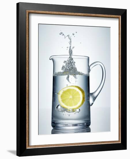 Lemon Falling into Jug of Water-Petr Gross-Framed Photographic Print