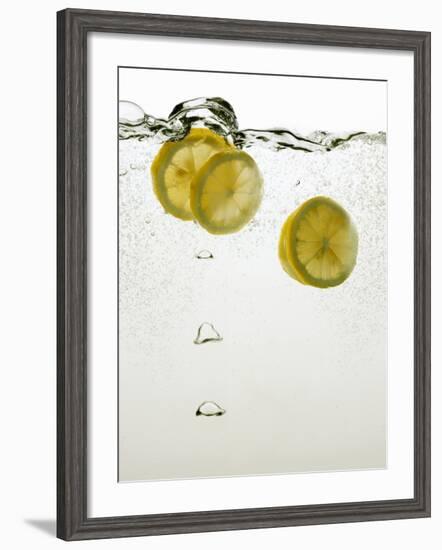 Lemon Slices in Water-Paul Blundell-Framed Photographic Print