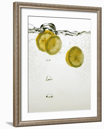 Lemon Slices in Water-Paul Blundell-Framed Photographic Print