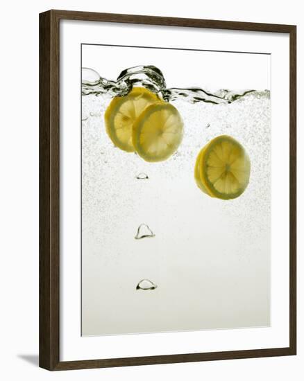 Lemon Slices in Water-Paul Blundell-Framed Photographic Print